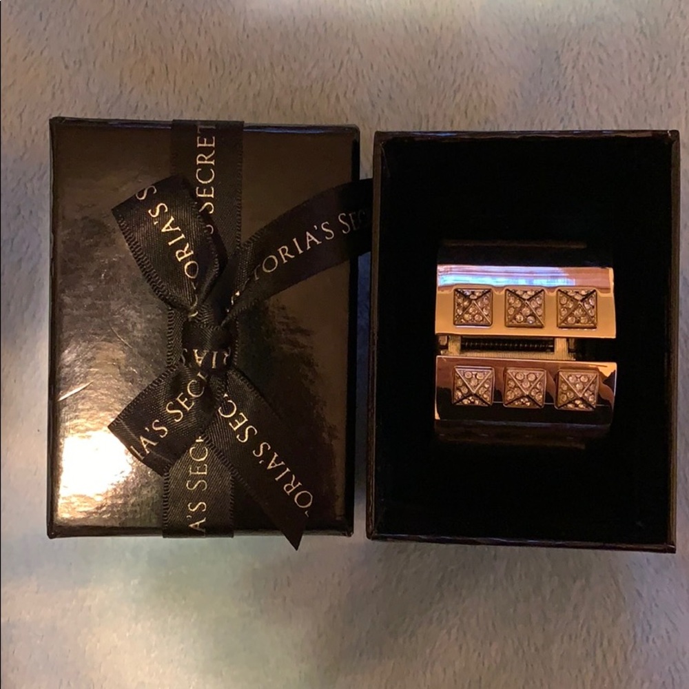 Victoria’s Secret gold sparkle bracelet.